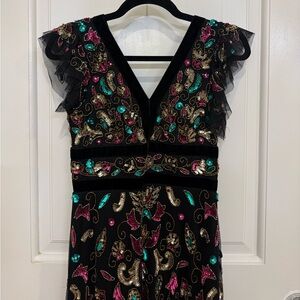 Floral Beaded Mermaid Gown With Flutter Cap Sleeves In Black